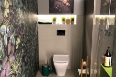 ściany i posadzka w łazience wykończone mikrocementem